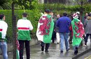 1 April 2000; Wales supporters make their way to the stadium prior to the Lloyds TSB 6 Nations match between Ireland and Wales at Lansdowne Road in Dublin. Photo by Brendan Moran/Sportsfile