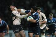 18 November 2007; Stan Wright, Leinster, holds off the  tackle of Yannick Jauzion, Toulouse. Heineken Cup, Pool 6, Round 2, Toulouse v Leinster, Toulouse, France. Picture credit; Matt Browne / SPORTSFILE *** Local Caption ***