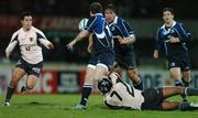 18 November 2007; Gordon D'Arcy, Leinster, is tackled by theirry Dusautoir, Toulouse. The tackle lead to D'Arcy having to go off with an injury later in the game. Heineken Cup, Pool 6, Round 2, Toulouse v Leinster, Toulouse, France. Picture credit; Matt Browne / SPORTSFILE