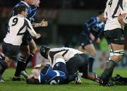 18 November 2007; Gordon D'Arcy, Leinster, lies injured after being tackled by theirry Dusautoir, Toulouse. The tackle lead to D'Arcy having to go off with an injury later in the game. Heineken Cup, Pool 6, Round 2, Toulouse v Leinster, Toulouse, France. Picture credit; Matt Browne / SPORTSFILE