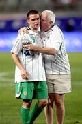 21 November 2007; David Healy, Northern Ireland, is consoled by a supporter at the end of the game. 2008 European Championship Qualifier, Spain v Northern Ireland, Estadio de Gran Canaria, Las Palmas, Spain. Picture credit; Oliver McVeigh / SPORTSFILE