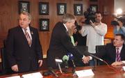 22 November 2007; GAA President Nickey Brennan stands up after the press conference to announce that Paraic Duffy, from Scotstown, Co Monaghan, will succeed Liam Mulvihill as Director General (Ard Stiúrthóir) of the Association. Mr Duffy, centre, shakes hands with the Stadium Director Peter McKenna as the press conference closes. Croke Park, Dublin. Picture credit; Caroline Quinn / SPORTSFILE