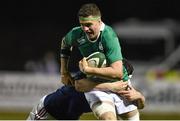 13 February 2015; Josh Murphy, Ireland, is tackled by Michael Simutoga, France. U20's Six Nations Rugby Championship, Ireland v France, Dubarry Park, Athlone, Co. Westmeath. Picture credit: Ramsey Cardy / SPORTSFILE