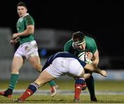 13 February 2015; Josh Murphy, Ireland, is tackled by Julien Marchand, France. U20's Six Nations Rugby Championship, Ireland v France, Dubarry Park, Athlone, Co. Westmeath. Picture credit: Ramsey Cardy / SPORTSFILE