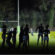 13 February 2015; Ireland players keep warm after floodlight failure in their game against France. Women's Six Nations Rugby Championship, Ireland v France, Ashbourne RFC, Ashbourne, Co. Meath. Picture credit: David Maher / SPORTSFILE
