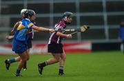 18 November 2007; Regina Glynn, Athenry, Galway, in action against Claire Grogan, Cashel, Tipperary. All-Ireland Senior Camogie Club Championship Final, Athenry, Galway v Cashel, Tipperary, Gaelic Grounds, Co. Limerick. Picture credit: Stephen McCarthy / SPORTSFILE