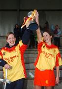 18 November 2007; Harps captain Catriona Phelan, left, and vice-captain Louise Mahony lift the cup. All-Ireland Junior Camogie Club Championship Final, Keady, Armagh v Harps, Laois, Stabannon Parnells, Stabannon, Co. Louth. Picture credit: Caroline Quinn / SPORTSFILE