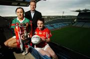 19 November 2007; Inch Rovers captain Annie Walsh, right, with Carnacon captain Caroline McGing and Declan Moran, Director of Marketing & Business Development, Vhi Healthcare, at a photocall ahead of the VHI Healthcare All-Ireland Ladies Football Club Championship Finals. The Senior Final between Carnacon of Mayo and Inch Rovers, from Cork, and the Intermediate Final between Mourneabbey, from Cork, and Glen, from Derry, take place this weekend, 25th November, as a double header in St Rynagh's GAA Club, Banagher, Co. Offaly with the Junior Final between West Clare Gaels and Foxrock Cabinteely taking place on Sunday 2nd December. Croke Park, Dublin. Picture credit: Brendan Moran / SPORTSFILE  *** Local Caption ***