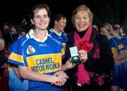 18 November 2007; Sinead Millea, Cashel, Tipperary, captain, is presented with her medal by Liz Howard, Uachtarán Chumann Camógaíochta na nGael, after the match. All-Ireland Senior Camogie Club Championship Final, Athenry, Galway v Cashel, Tipperary, Gaelic Grounds, Co. Limerick. Picture credit: Stephen McCarthy / SPORTSFILE