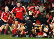 24 November 2007; Donnacha Ryan, Munster, is tackled by Aled Thomas, Newport Gwent Dragons. Magners League, Munster v Newport Gwent Dragons, Musgrave Park, Cork. Picture credit; Brendan Moran / SPORTSFILE