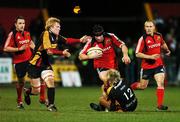 24 November 2007; Denis Leamy, Munster, is tackled by Ashley Smith, 12, and Jamie Ringer, Newport Gwent Dragons. Magners League, Munster v Newport Gwent Dragons, Musgrave Park, Cork. Picture credit; Brendan Moran / SPORTSFILE