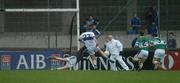 25 November 2007; Patrick Gilroy, St. Vincent's, shoots past goalkeeper Michael Nolan, Cahir Healy, 2, and Eoin Bland, Portlaoise, to score his side's third goal. AIB Leinster Senior Club Football Championship Semi-Final, St. Vincent's, Dublin, v Portlaoise, Laois. Parnell Park, Dublin. Picture credit; Stephen McCarthy / SPORTSFILE