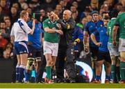 14 February 2015; Jonathan Sexton, Ireland, is attended to by team doctor Dr. Eanna Falvey and referee Wayne Barnes following a blood injury during the second half. RBS Six Nations Rugby Championship, Ireland v France. Aviva Stadium, Lansdowne Road, Dublin. Picture credit: Brendan Moran / SPORTSFILE