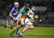 14 February 2015; Shane Dooley, Offaly, in action against Tom Delaney, Laois. Allianz Hurling League Division 1B, Round 1, Laois v Offaly. O'Moore Park, Portlaoise, Co. Laois. Picture credit: Ray McManus / SPORTSFILE