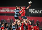 14 February 2015; Billy Holland, Munster, takes the ball in the lineout ahead of Macauley Cook, Cardiff Blues. Guinness PRO12 Round 14, Munster v Cardiff Blues. Irish Independent Park, Cork. Picture credit: Matt Browne / SPORTSFILE