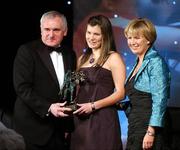 17 November 2007; Ciara Hegarty, Donegal, is presented with her Ulster Player of the Year by An Taoiseach Bertie Ahern T.D. in the company of Geraldine Giles, President, Cumann Peil na mBan, at the 2007 O'Neills/TG4 Ladies Gaelic Football All-Star Awards. Citywest Hotel, Conference, Leisure & Golf Resort, Saggart, Co. Dublin. Picture credit: Brendan Moran / SPORTSFILE  *** Local Caption ***