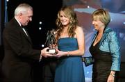 17 November 2007; Amy Connolly, Dublin, is presented with her Leinster Player of the Year by An Taoiseach Bertie Ahern T.D. in the company of Geraldine Giles, President, Cumann Peil na mBan, at the 2007 O'Neills/TG4 Ladies Gaelic Football All-Star Awards. Citywest Hotel, Conference, Leisure & Golf Resort, Saggart, Co. Dublin. Picture credit: Brendan Moran / SPORTSFILE  *** Local Caption ***