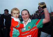 25 November 2007; Player of the match Michelle McGing, Carnacon, Mayo, celebrates with her son Conor, age 2, after the match. VHI Healthcare All-Ireland Ladies Senior Club Football Championship Final, Carnacon, Mayo v Inch Rovers, Cork, St Rynaghs GAA, Club, Banagher, Co. Offaly. Picture credit: Brian Lawless / SPORTSFILE