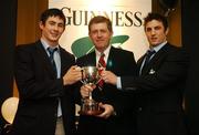 26 November 2007; Members of the Ireland U20's Grand Slam winning team Felix Jones, left, and Kevin Sheehan, acceps the Team of the Year award on behalf of the Ireland U20 team from Peter O'Reilly, Chairman of the Rugby Writers of Ireland. 2007 Guinness Rugby Writers of Ireland Awards, Fitzpatrick Castle Hotel, Killiney, Co. Dublin. Picture credit: Brendan Moran / SPORTSFILE  *** Local Caption ***