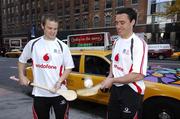 30 November 2007; Kilkenny All-Star Tommy Walsh and Galway's Alan Kerins demonstrate their skills on 42nd Street. 2007 Vodafone GAA All-Stars Hurling Tour, The New York Helinsley Hotel, 42nd Street, New York, USA. Picture credit: Ray McManus / SPORTSFILE