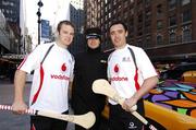 30 November 2007; Kilkenny All-Star Tommy Walsh and Galway's Alan Kerins demonstrate their skills to the New York Helinsley Hotel 'bell captain' Denis O'Connor who hails from Crossmolina, Co. Mayo, on 42nd Street. 2007 Vodafone GAA All-Stars Hurling Tour, The New York Helinsley Hotel, 42nd Street, New York, USA. Picture credit: Ray McManus / SPORTSFILE