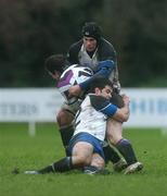 1 December 2007; Adam Hughes, Terenure, is tackled by Dermot O'Kane, 12, and Ed Leamy, Cork Constitution.  AIB League Division 1, Terenure v Cork Constitution, Lakelands Park, Terenure, Dublin. Picture credit: Stephen McCarthy / SPORTSFILE