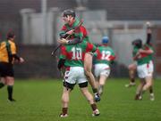 2 December 2007; Sean Ryan, 10, and Paul O'Meara, Birr, celebrate at the final whistle. AIB Leinster Club Hurling Championship Final, Loughmore-Castleiney, Birr, Offaly, v Ballyboden St Enda's, Dublin, O'Connor Park, Tullamore, Co. Offaly. Picture credit; Caroline Quinn / SPORTSFILE