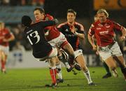 8 December 2007; Morgan Stoddart, Llanelli Scarlets, is tackled by Rua Tipoki, Munster. Heineken Cup, Pool 5, Round 3, Llanelli Scarlets v Munster, Stradey Park, Llanelli, Wales. Picture credit; Matt Browne / SPORTSFILE