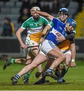 14 February 2015; William Hyland, Laois, is taken down by Offaly's Niall Wynne late in the game. Allianz Hurling League Division 1B, Round 1, Laois v Offaly. O'Moore Park, Portlaoise, Co. Laois. Picture credit: Ray McManus / SPORTSFILE