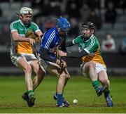14 February 2015; Stephen Maher, Laois, is tackled by  Offaly's Dermot Shortt, left, and Niall Wynne. Allianz Hurling League Division 1B, Round 1, Laois v Offaly. O'Moore Park, Portlaoise, Co. Laois. Picture credit: Ray McManus / SPORTSFILE