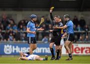 15 February 2015; Dublin's Conal Keaney is shown a yellow card by referee Barry Kelly after a tumble over Shane McGrath, Tipperary. Allianz Hurling League, Division 1A, Round 1, Dublin v Tipperary, Parnell Park, Dublin. Picture credit: Ray McManus / SPORTSFILE
