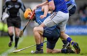 15 February 2015; Dublin's Paul Schutte tries to win possession of the sliothar under pressure from Tipperary's Denis Maher. Allianz Hurling League, Division 1A, Round 1, Dublin v Tipperary, Parnell Park, Dublin. Picture credit: Ray McManus / SPORTSFILE