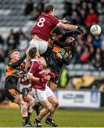 15 February 2015; Patsy Bradley, Slaughtneil, attempts to catch a kick out ahead of Greg Horan, left, and Conor Jordan, right, Austin Stacks. AIB GAA Football All-Ireland Senior Club Championship, Semi-Final, Austin Stacks v Slaughtneil, O'Moore Park, Portlaoise, Co. Laois. Picture credit: Brendan Moran / SPORTSFILE