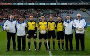 14 February 2015; Officials James Murray and Kieran Hughes, standby referee John Hickey, match referee Paddy Neilan, linesman Niall Cullen, fourth official Marty Parker, and officials James Morris and Tom Morris. AIB GAA Football All-Ireland Junior Club Championship Final, John Mitchel's v Brosna. Croke Park, Dublin. Picture credit: Oliver McVeigh / SPORTSFILE