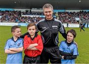 15 February 2015; Match referee Barry Kelly with Daniel Sheridan, aged 9, from Scoil Mhuire, Howth, Nathan Fitzpatrick, from Holy Trinity, Donaghmede, and Sean O'Grady, aged 10, from St Bridget's, Killester, before the game. Allianz Hurling League, Division 1A, Round 1, Dublin v Tipperary, Parnell Park, Dublin. Picture credit: Ray McManus / SPORTSFILE