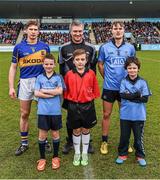 15 February 2015; Match referee Barry Kelly with the Tipperary captain, Brendan Maher, and the Dublin captain, Cian O'Callaghan, with Daniel Sheridan, aged 9, from Scoil Mhuire, Howth, Nathan Fitzpatrick, from Holy Trinity, Donaghmede, and Sean O'Grady, aged 10, from St Bridget's, Killester, before the game. Allianz Hurling League, Division 1A, Round 1, Dublin v Tipperary, Parnell Park, Dublin. Picture credit: Ray McManus / SPORTSFILE