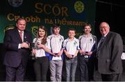 14 February 2015; The Spa Cill Airne, Co. Kerry, team of Niamh Ni Chlumhain, Tomas Pleamonn, Micheal O hEithrirn and Seamus O Loiinsigh are presented with their trophy by Uachtaran Cumann Luthcleas Gael Liam O Neill, left, and Liam O Laochdha, Cathaoirleach, Coiste Naisiunta Scor, right, after winning the Table Quiz competition at the All-Ireland Scór na nÓg Championship Finals 2015. Citywest Hotel, Saggart, Co. Dublin. Picture credit: Pat Murphy / SPORTSFILE