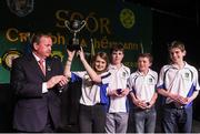 14 February 2015; The Spa Cill Airne, Co. Kerry, team of Niamh Ni Chlumhain, Tomas Pleamonn, Micheal O hEithrirn and Seamus O Loiinsigh are presented with their trophy by Uachtaran Cumann Luthcleas Gael Liam O Neill after winning the Table Quiz competition at the All-Ireland Scór na nÓg Championship Finals 2015. Citywest Hotel, Saggart, Co. Dublin. Picture credit: Pat Murphy / SPORTSFILE
