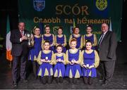 14 February 2015; The Spa, Co. Kerry, team of Aine Ni Bhrosnachain, Caitlin Ni Chroinin, Lamia Switzer, Eabha Ni Shuilleabhain, Sorcha Randal, Leah Ni Mhuimhneachain, Rachel Ni Mhuimhneachain and Megan Ni Chroinin, are presented with their trophy after winning the Figure Dancing competition during the All-Ireland Scór na nÓg Championship Finals 2015. Citywest Hotel, Saggart, Co. Dublin. Picture credit: Pat Murphy / SPORTSFILE