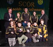 14 February 2015; The The Downs, Co. Westmeath, team of, back row, from left, Niamh Rowan, Paul Lynam and Serena Wynne. Front row from left, Megan Keenaghan, Tom Tuite, Ruairi Shiel, Donal Doherty and Matthew Cunningham are presented with their trophy by Uachtaran Cumann Luthcleas Gael Liam O Neill, left, and Liam O Laochdha, Cathaoirleach, Coiste Naisiunta Scor, right, after winning the Leiriu competition during the All-Ireland Scór na nÓg Championship Finals 2015. Citywest Hotel, Saggart, Co. Dublin. Picture credit: Pat Murphy / SPORTSFILE