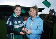 2 December 2007; Player of the Match Ciara Murphy, Foxrock Cabinteely, is presented with the trophy by and Karen Ryan, Vhi Healtcare Munster. VHI Healthcare All-Ireland Ladies Junior Club Football Championship Final, West Clare Gaels, Clare v Foxrock Cabinteely, Dublin, Toomevarra, Co. Tipperary. Picture credit: Brian Lawless / SPORTSFILE