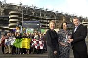 4 December 2007; Mary Conlon, of the Claregalway club, who was presented with the inaugural Vhi Healthcare Ladies Football Club Person of the Year Award by Geraldine Giles, Uactaran Peil Gael na mBan, and Declan Moran, Director of Marketing and Product Development, Vhi Healthcare. Also pictured are family and friends who travelled to Croke Park to support her. Conlon was singled out from over 100 individual nominations posted on the Ladies Gaelic website over the past four weeks. The Vhi Healthcare Club Person of the Year Award recognises and celebrates the contributions of club individuals who have had an extraordinary impact on their club. Croke Park, Dublin. Photo by Sportsfile