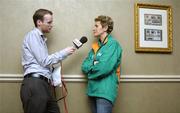 6 December 2007; Anne Keenan-Buckley, team manager, being interviewed by Oisin Langan, Newstalk, after a press conference ahead of the Spar European Cross Country Championships which take place this Sunday in Toro, Spain. Westin Hotel, College Green, Dublin. Picture credit: Stephen McCarthy / SPORTSFILE *** Local Caption ***