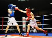 7 December 2007; Graham Keating, St. Saviours OBA, right, in action against Gavin Keating, St. Saviours OBA, during the 57Kg category at the National Intermediate Boxing Championships. Graham Keating.v.Gavin Keating, National Stadium, Dublin. Picture credit; Stephen McCarthy / SPORTSFILE