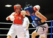 7 December 2007; Graham Keating, St. Saviours OBA, left, in action against Gavin Keating, St. Saviours OBA, during the 57Kg category at the National Intermediate Boxing Championships. Graham Keating.v.Gavin Keating, National Stadium, Dublin. Picture credit; Stephen McCarthy / SPORTSFILE *** Local Caption ***