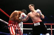 8 December 2007; Paul McCloskey in action against Tontcho Tontchev for the IBF International Light Welterweight Title. Hunky Dory Fight Night, Paul McCloskey.v.Tontcho Tontchev, Conference Centre, Kings Hall, Belfast, Co. Antrim. Picture credit: Oliver McVeigh / SPORTSFILE