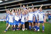 12 December 2007; Gaelscoil Thaobh na Coille captain Ciara Ni Eanachain is lifted by teammates as she holds the cup. Corn Irish Rubies, St Bridget's, Glasnevin v Gaelscoil Thaobh na Coille, Stepaside, Croke Park, Dublin. Picture credit; Caroline Quinn / SPORTSFILE