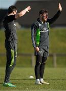 17 February 2015; Munster's JJ Hanrahan, right, and Felix Jones shield their eyes from the sun during squad training. University of Limerick, Limerick. Picture credit: Diarmuid Greene / SPORTSFILE