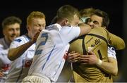 17 February 2015; University College Dublin players celebrate with their goalkeeper Niall Corbet after saving Mark Brennan's, Maynooth University, penalty in sudden death. Umbro CUFL Premier Division Final, University College Dublin v Maynooth University, Frank Cooke Park, Tolka Rovers, Dublin. Picture credit: Barry Cregg / SPORTSFILE