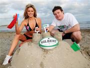 13 December 2007; Summer Time Dreaming - We may be heading into the festive season, but Ireland and Leinster Captain Brian O'Driscoll and model Jenny Lee Masterson, are getting ready for Beach TAG. Beach Tag will be part of the Official IRFU TAG Rugby season programme that will see over 10,000 players taking part in the non contact version of rugby at 21 venues across Ireland. Registration opens on January 14th on the official website www.irfutag.ie. Sandymount Strand, Sandymount, Dublin. Picture credit: Brian Lawless / SPORTSFILE
